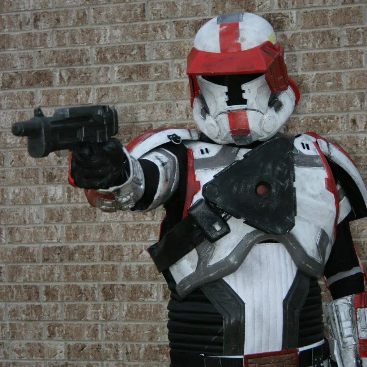 HAVOC Trooper full costume posed against a brick wall